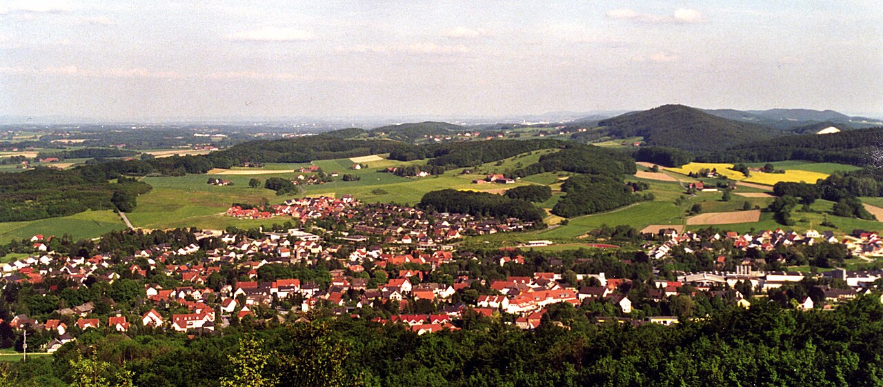 Photo shows the view of the town of Borgholzhausen from the Luisenturm. Taken in the – Luisenturm-Hütte